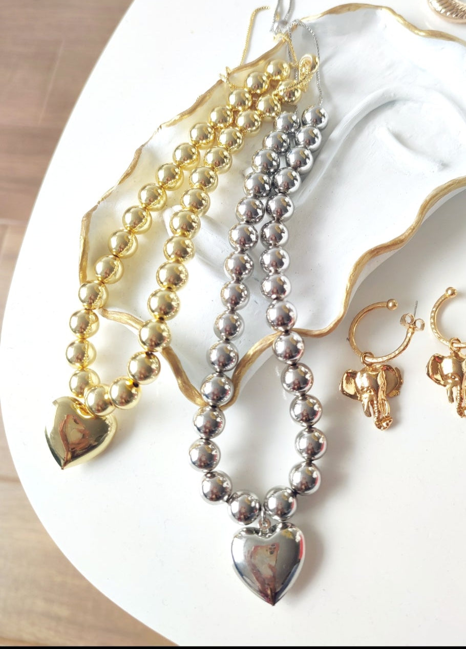 Collar choker graduable de corazón dorado y plateado