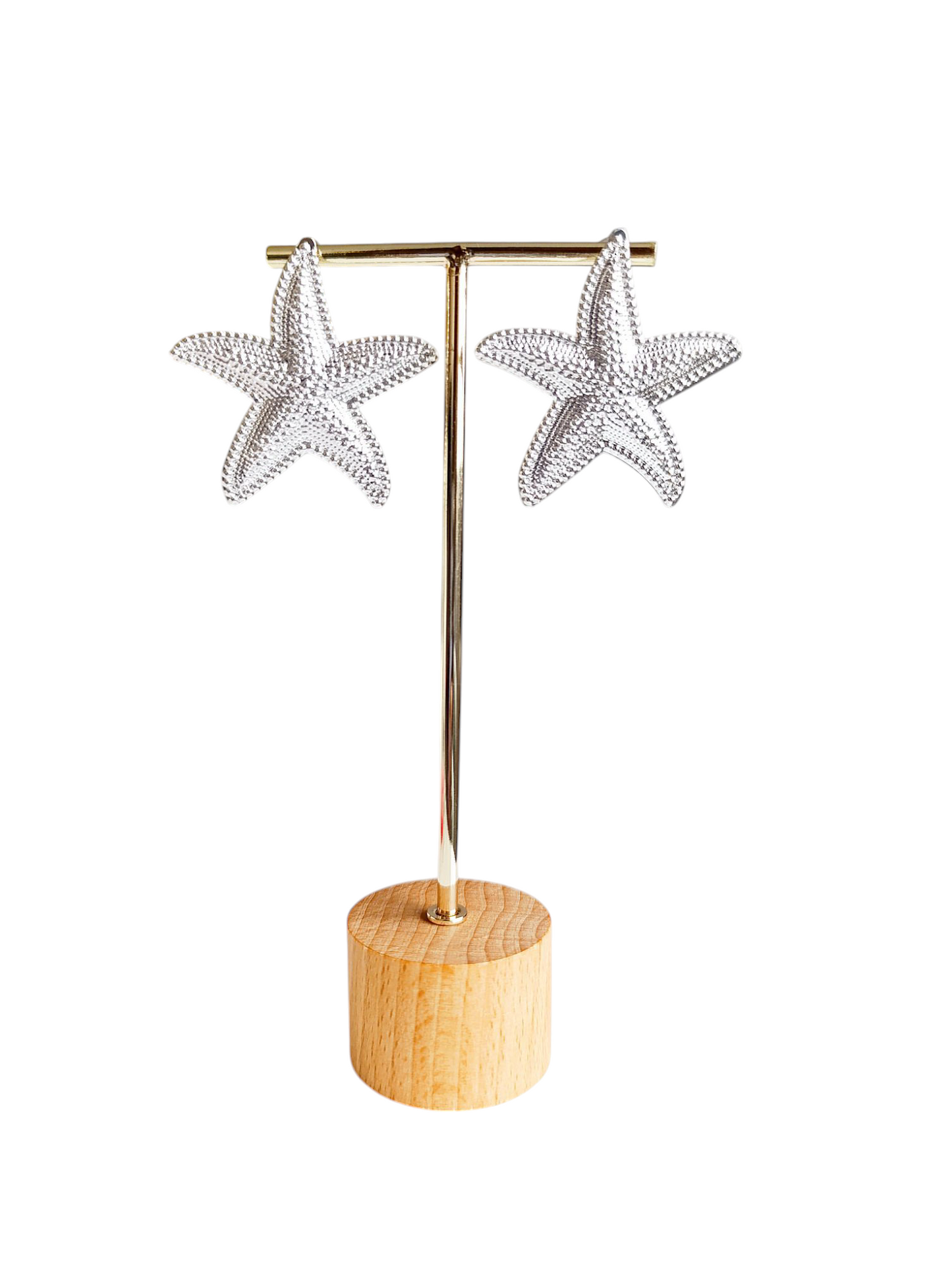 Aretes estrella baño en plata